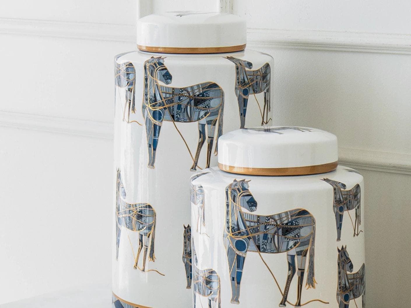 Eloisa Bundle canisters in white and blue, shown in a lifestyle right view as image 7