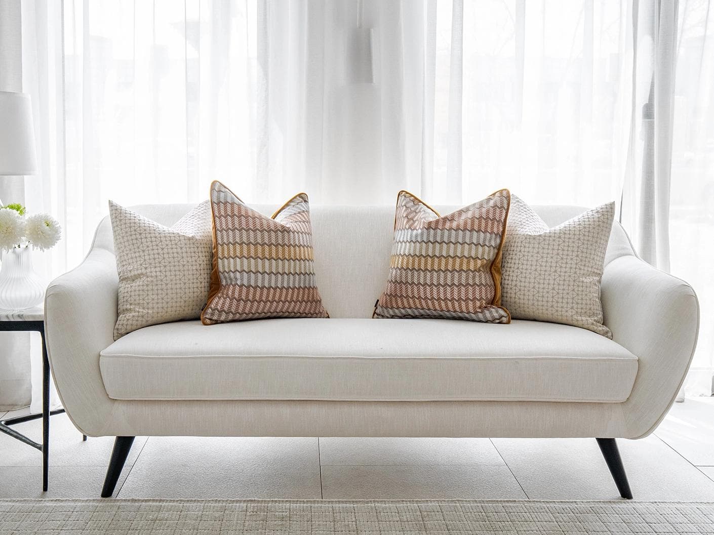 Camella Bundle bundle - indoor in orange, yellow, silver and white, shown in a lifestyle front view as image 1