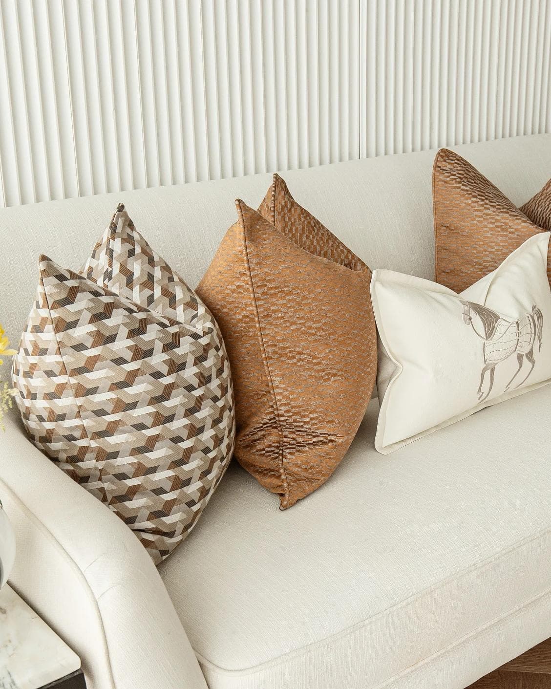 Nerola Bundle cushion in orange, beige and white, shown in a product left view as image 6