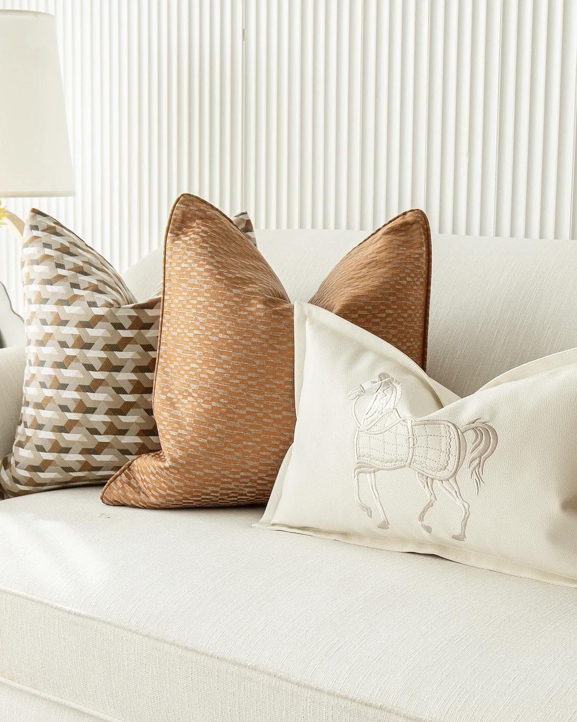 Nerola Bundle cushion in orange, beige and white, shown in a product right view as image 7