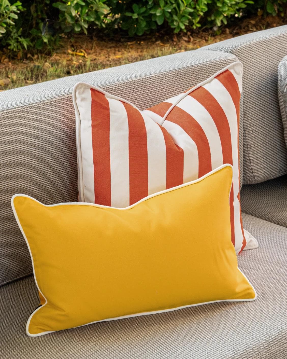 Aarush Bundle cushion in orange, yellow and ivory, shown in a lifestyle left view as image 5