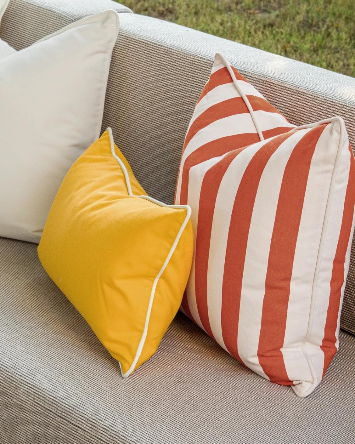 Aarush Bundle cushion in orange, yellow and ivory, shown in a lifestyle right view as image 6