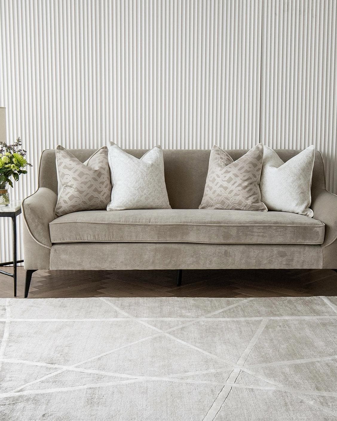Alicia Bundle cushion in white and beige, shown in a lifestyle front view as image 4