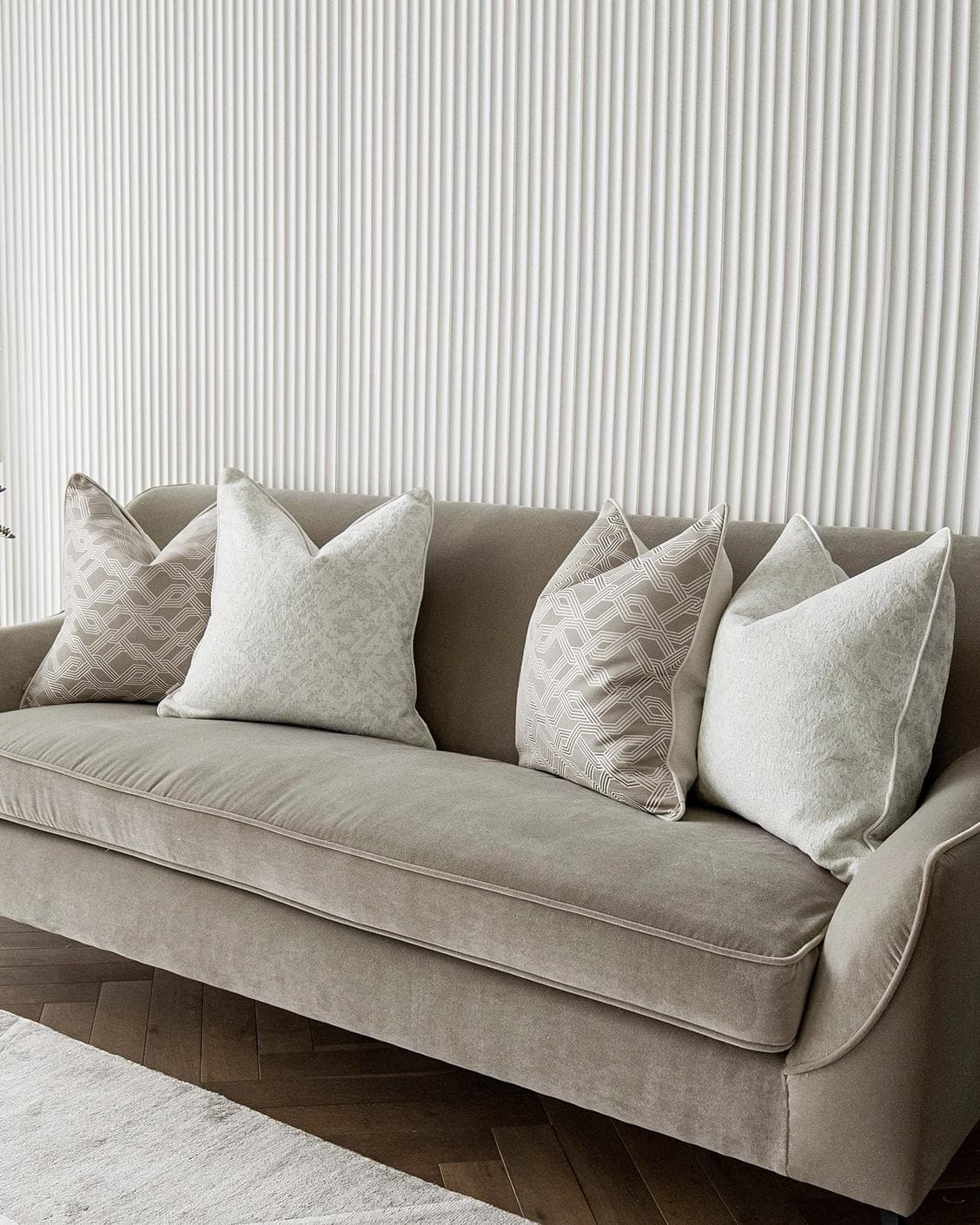 Alicia Bundle cushion in white and beige, shown in a lifestyle right view as image 2