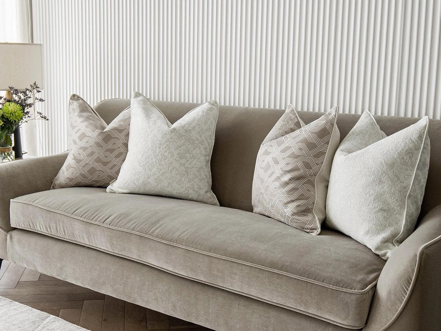 Alicia Bundle cushion in white and beige, shown in a lifestyle right view as image 2