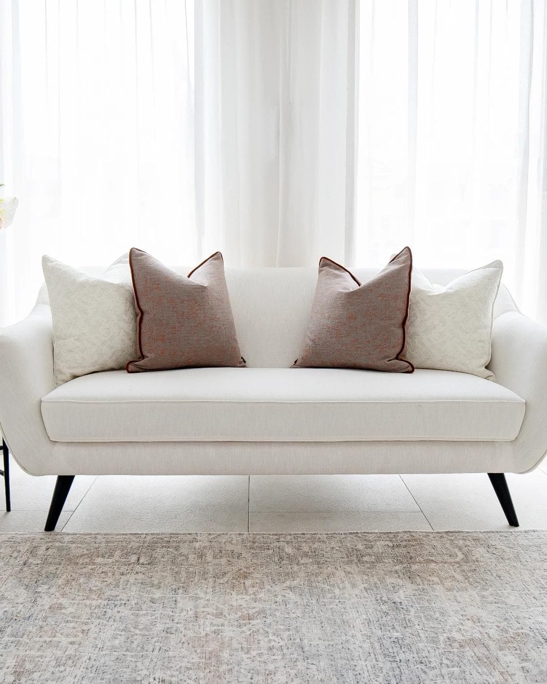 Cassie Bundle cushion in orange, white and red, shown in a product front view as image 6