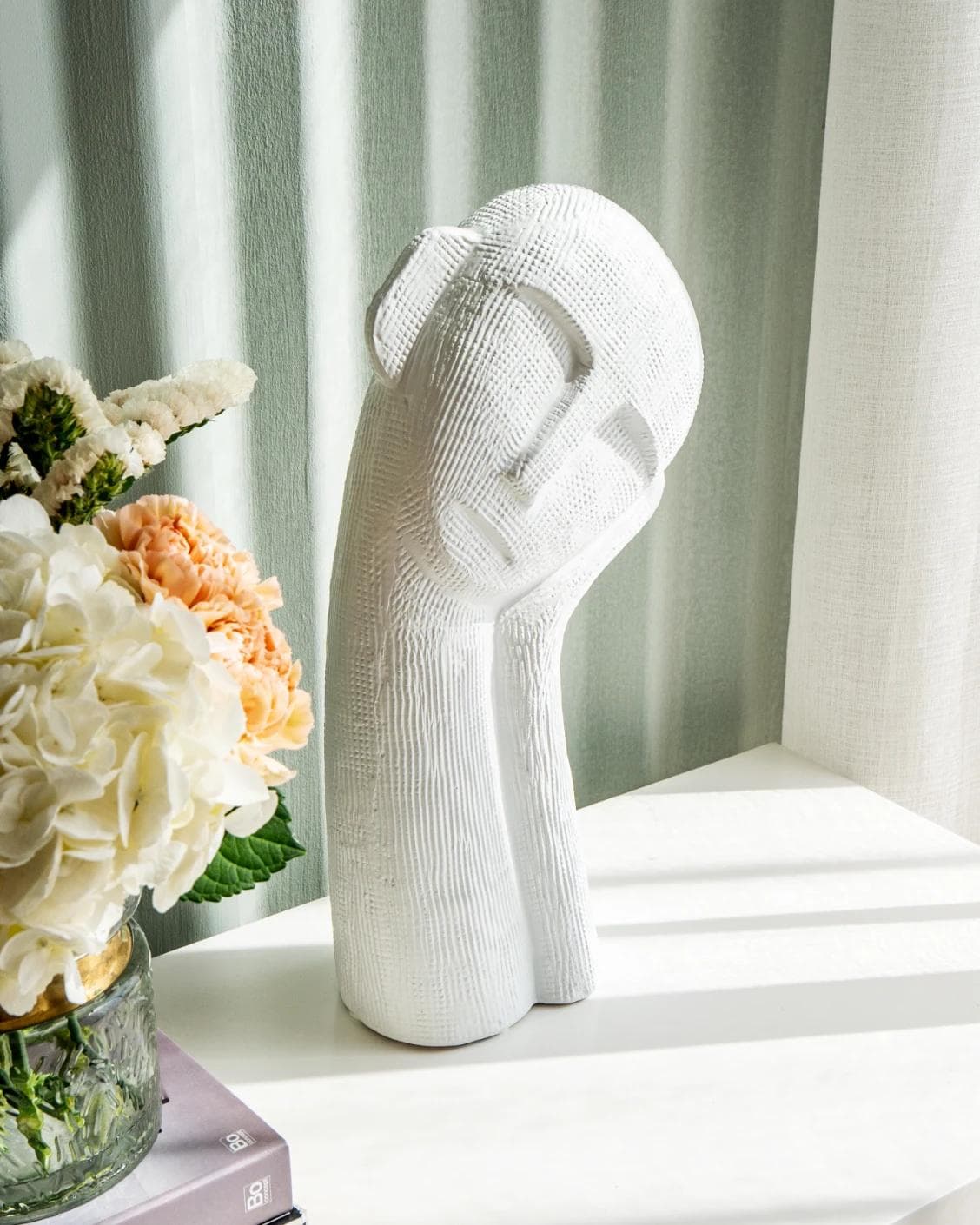 Addie Arneson statues and sculptures in white, shown in a lifestyle left view as image 6