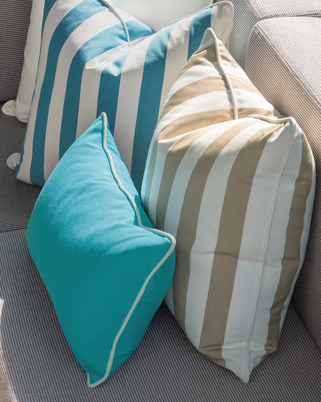 Aditya Bundle cushion in turquoise, beige and ivory, shown in a lifestyle right view as image 8