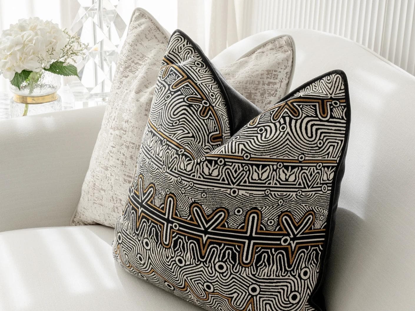 Adonis Bundle cushion in white, black and silver, shown in a lifestyle right view as image 6
