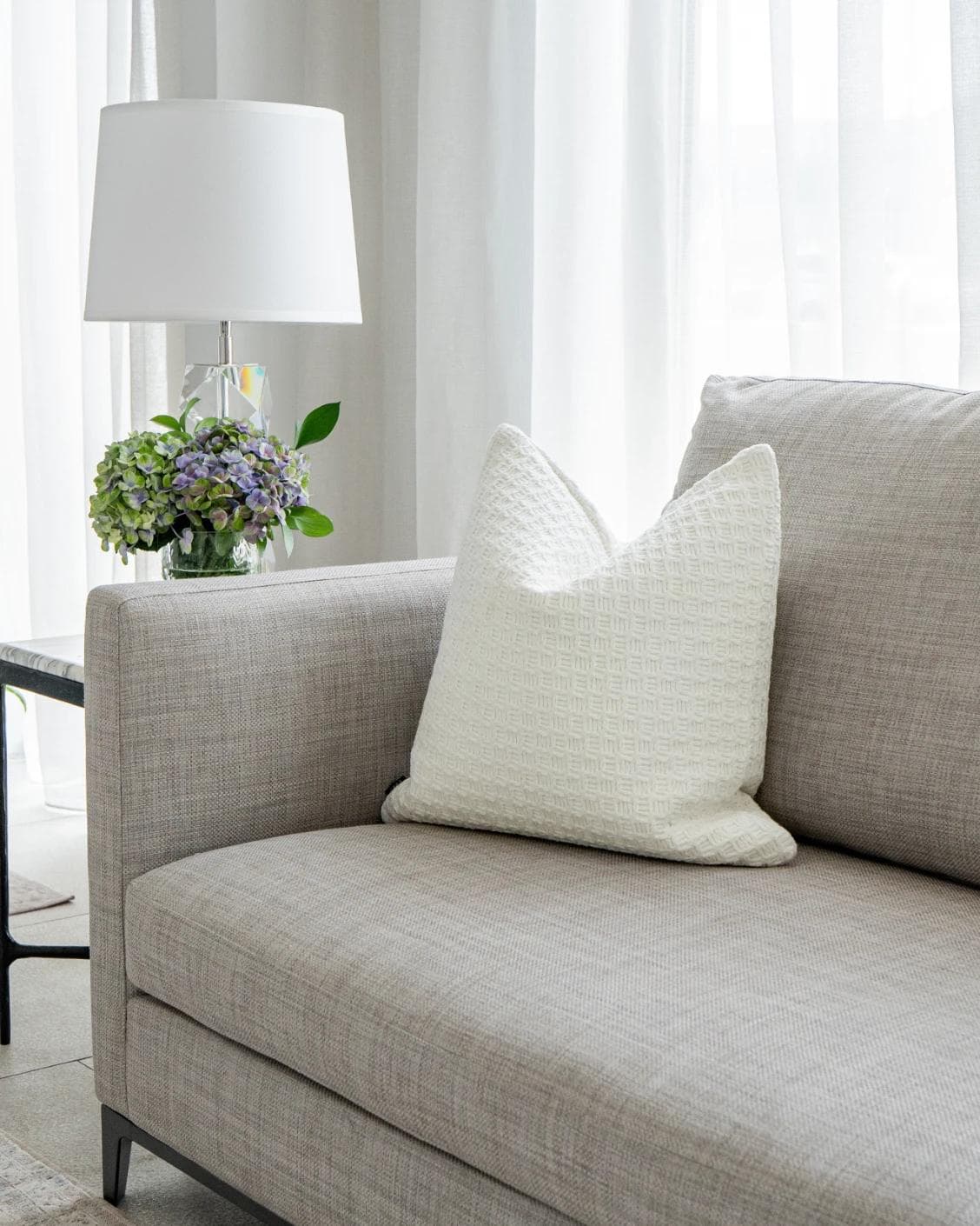 Adora Bianca cushion in white, shown in a product as image 2
