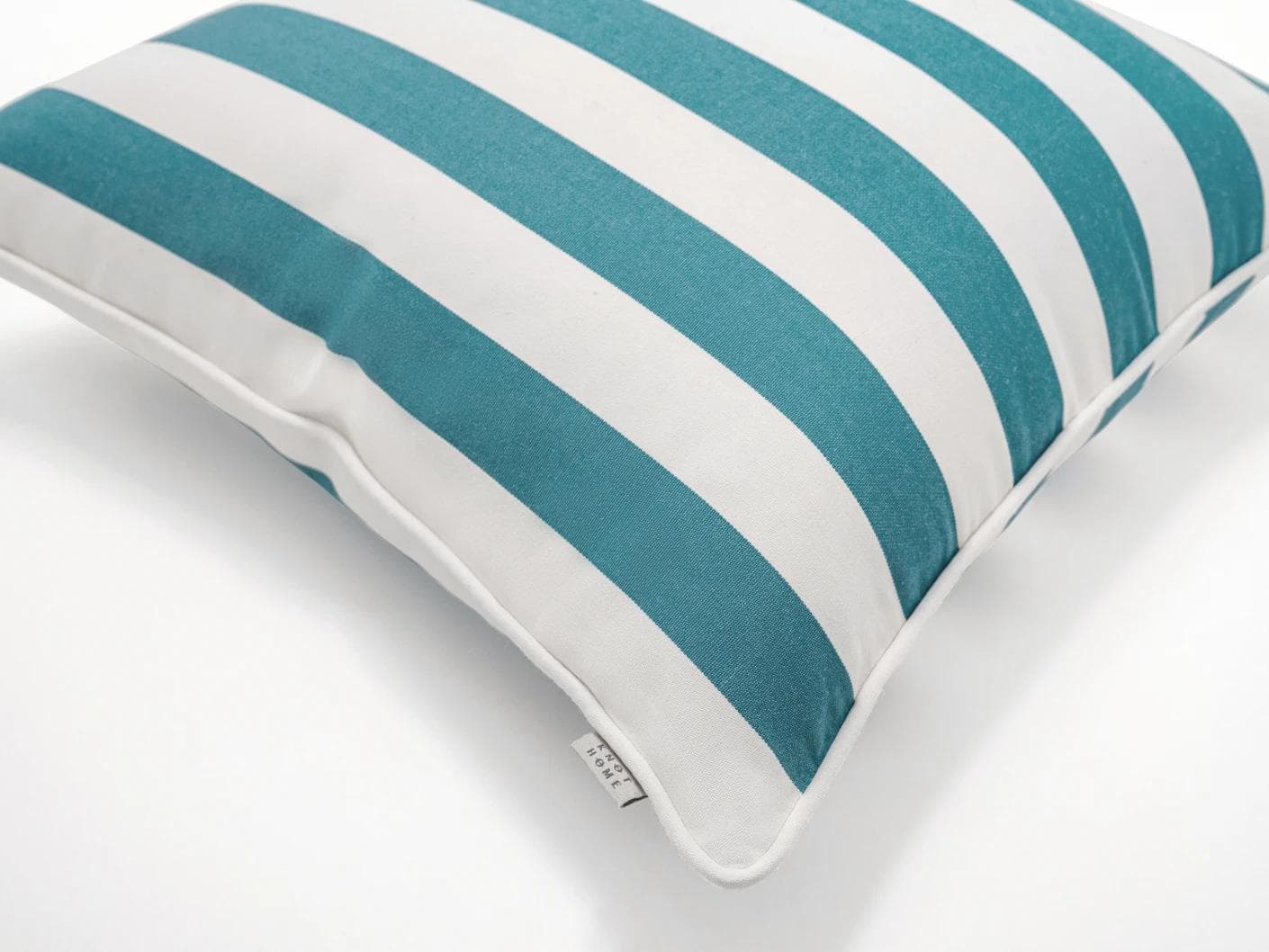 Aelia Azure cushion in blue and soft ivory, shown in a product top view as image 7