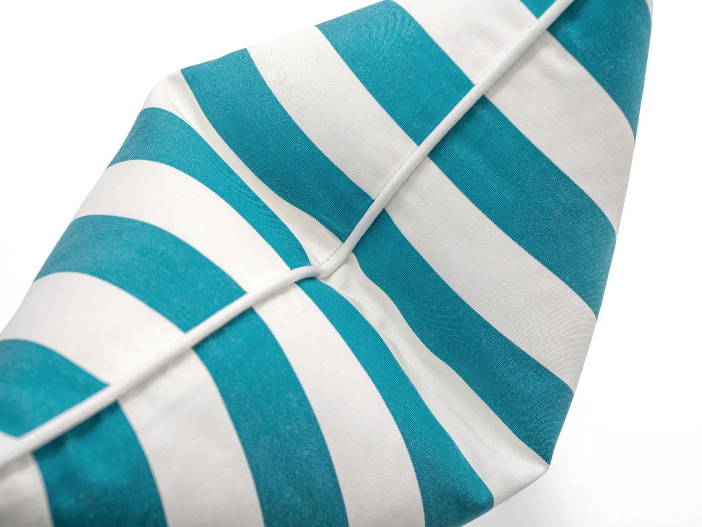 Aelia Azure cushion in blue and soft ivory, shown in a product top view as image 8
