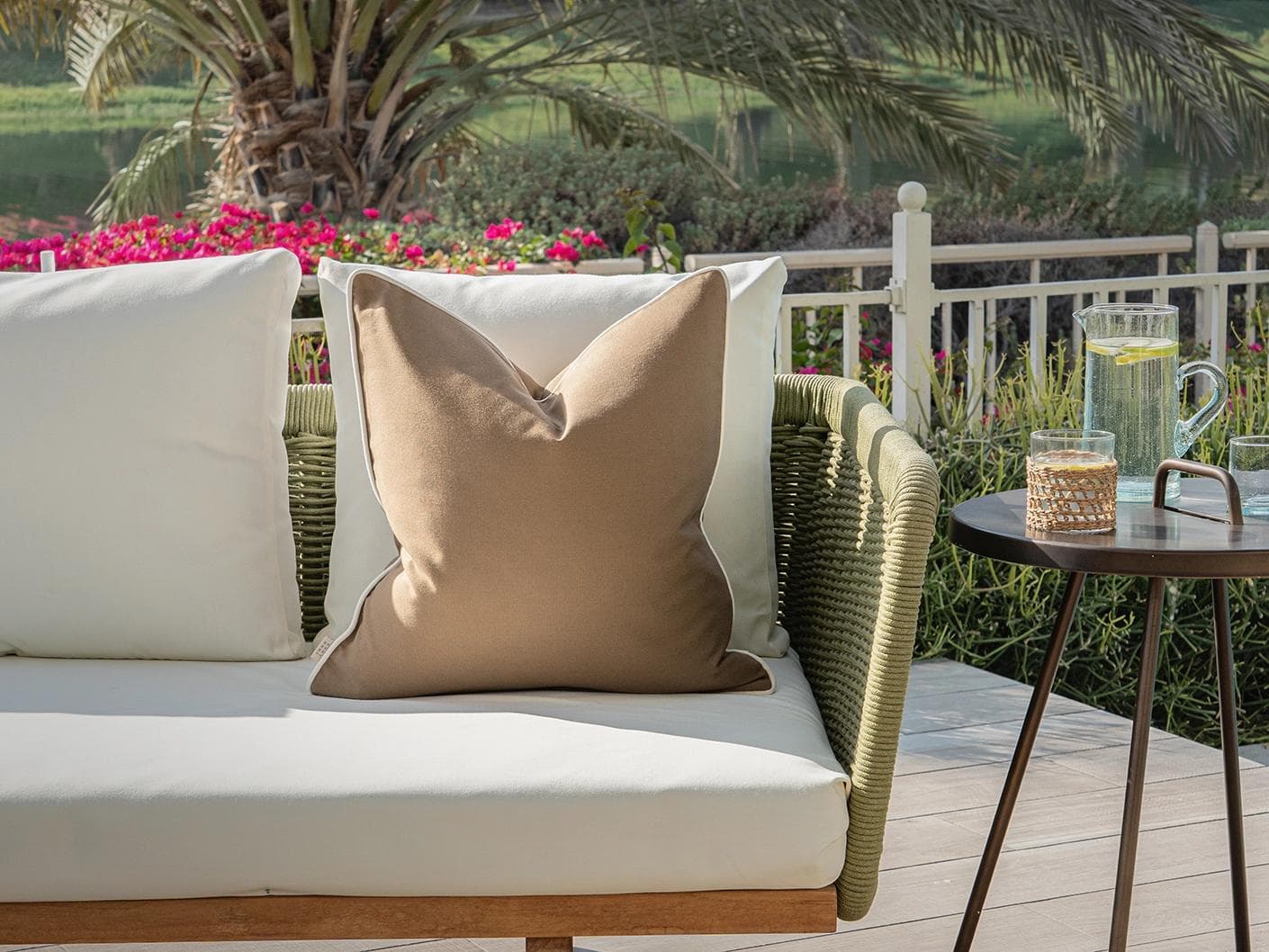 Aelia Braun cushion in brown, shown in a lifestyle front view as image 4