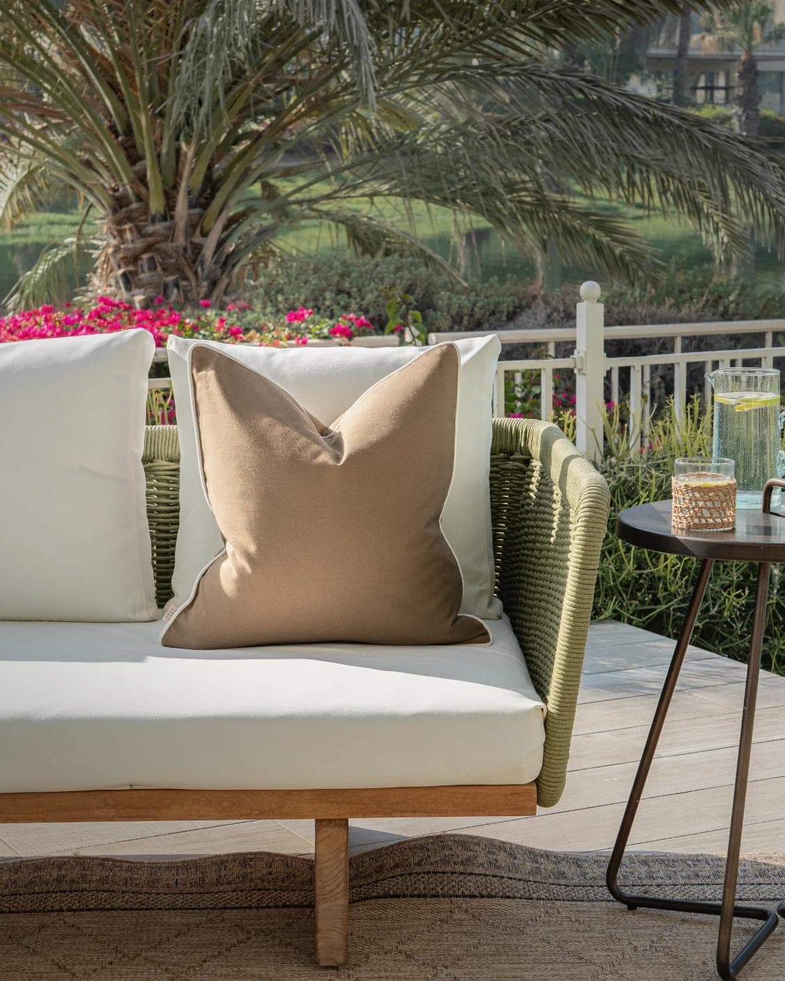 Aelia Braun cushion in brown, shown in a lifestyle front view as image 4