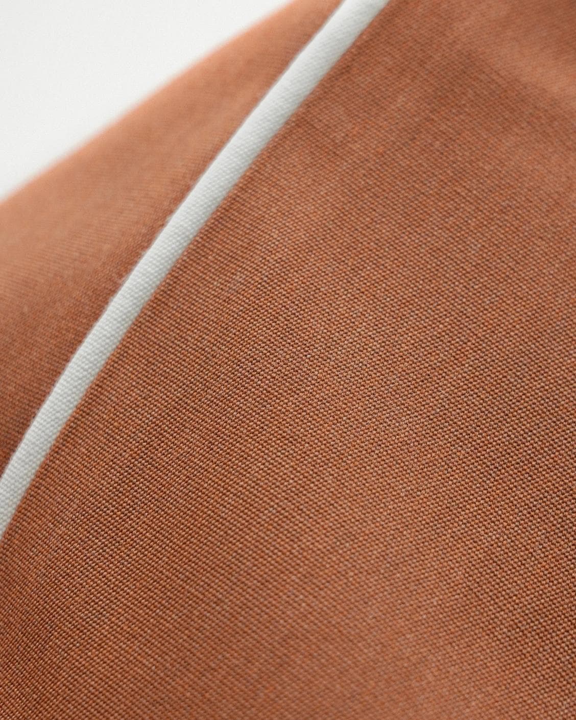 Aelia Clay II cushion in rust, shown in a product close-up as image 8