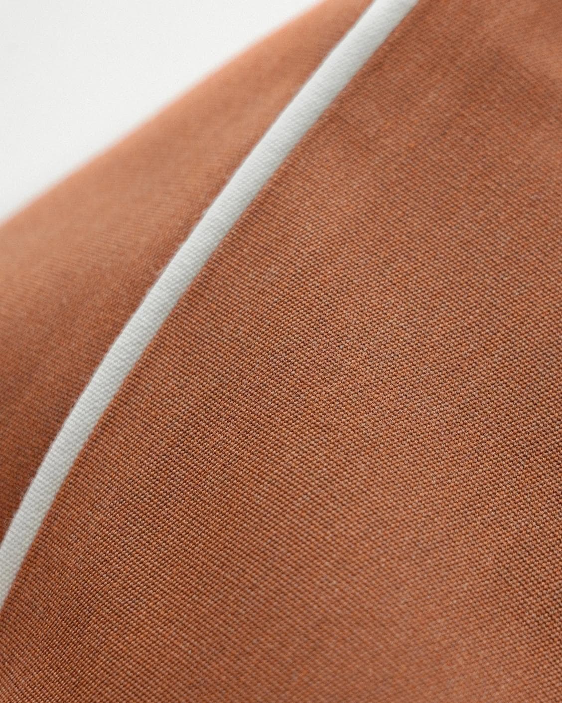 Aelia Clay cushion in rust, shown in a product front view as image 8