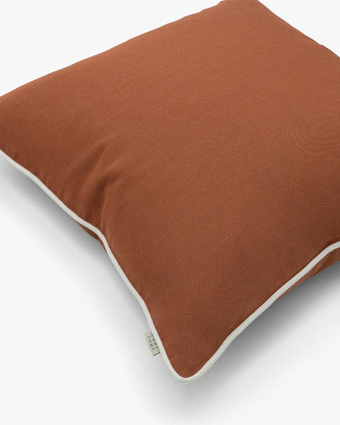 Aelia Clay cushion in rust, shown in a product top view as image 9