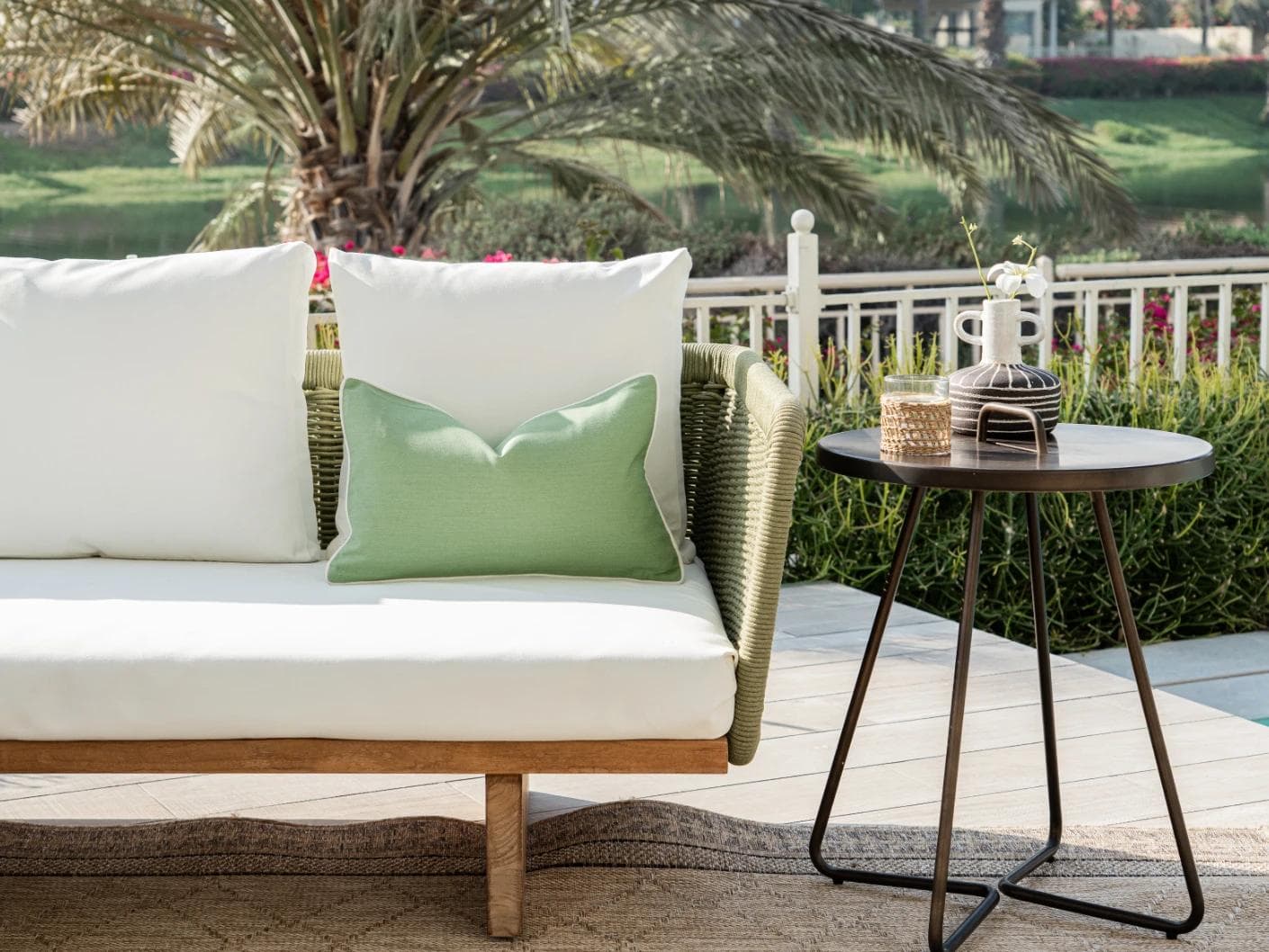 Aelia Fern II cushion in forest green and green, shown in a lifestyle front view as image 4