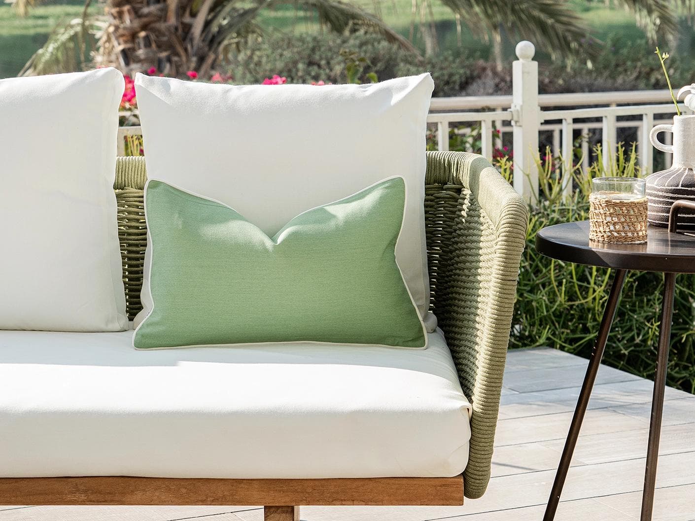 Aelia Fern II cushion in forest green and green, shown in a lifestyle front view as image 4