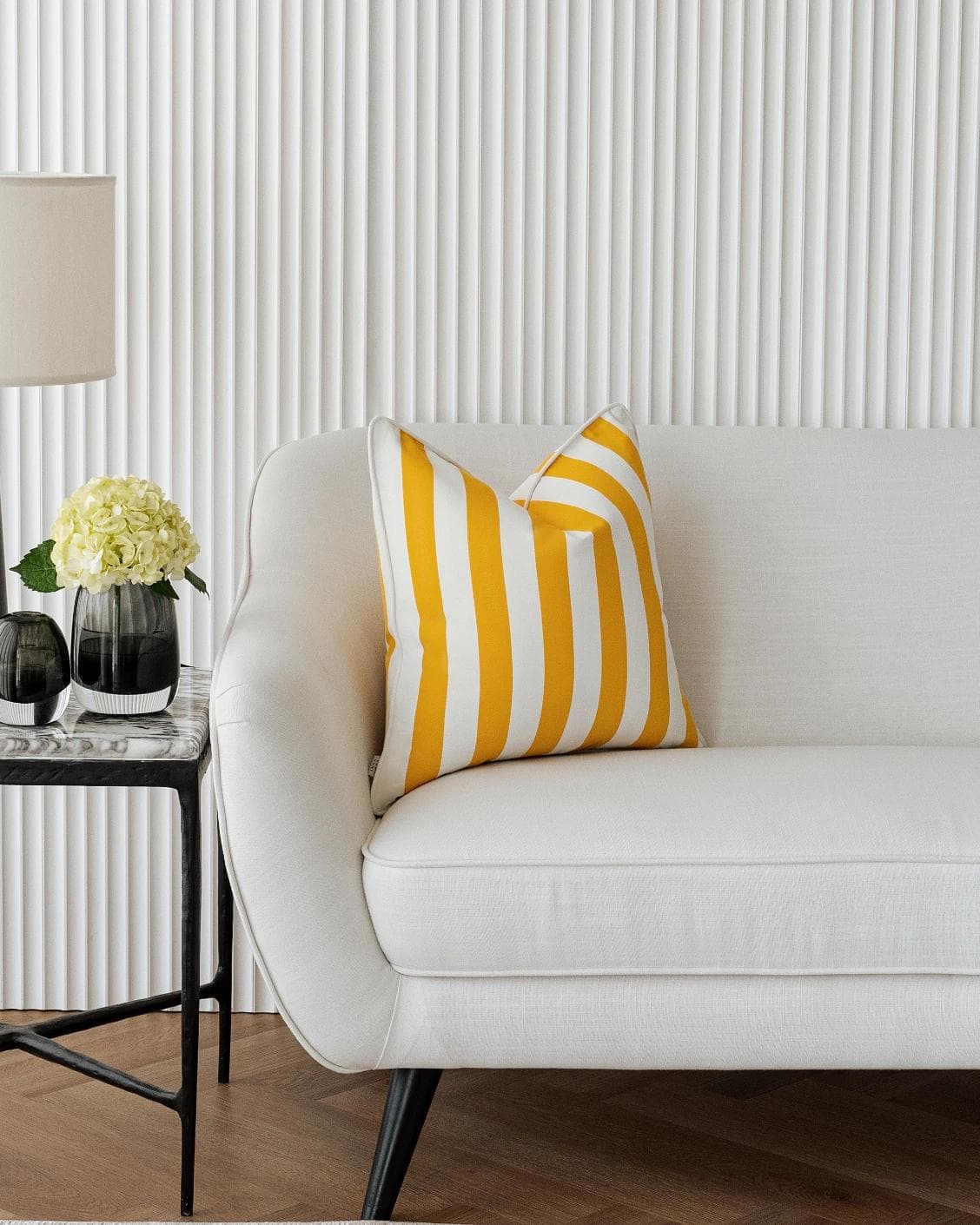 Aelia Gaze cushion in yellow, shown in a lifestyle left view as image 4