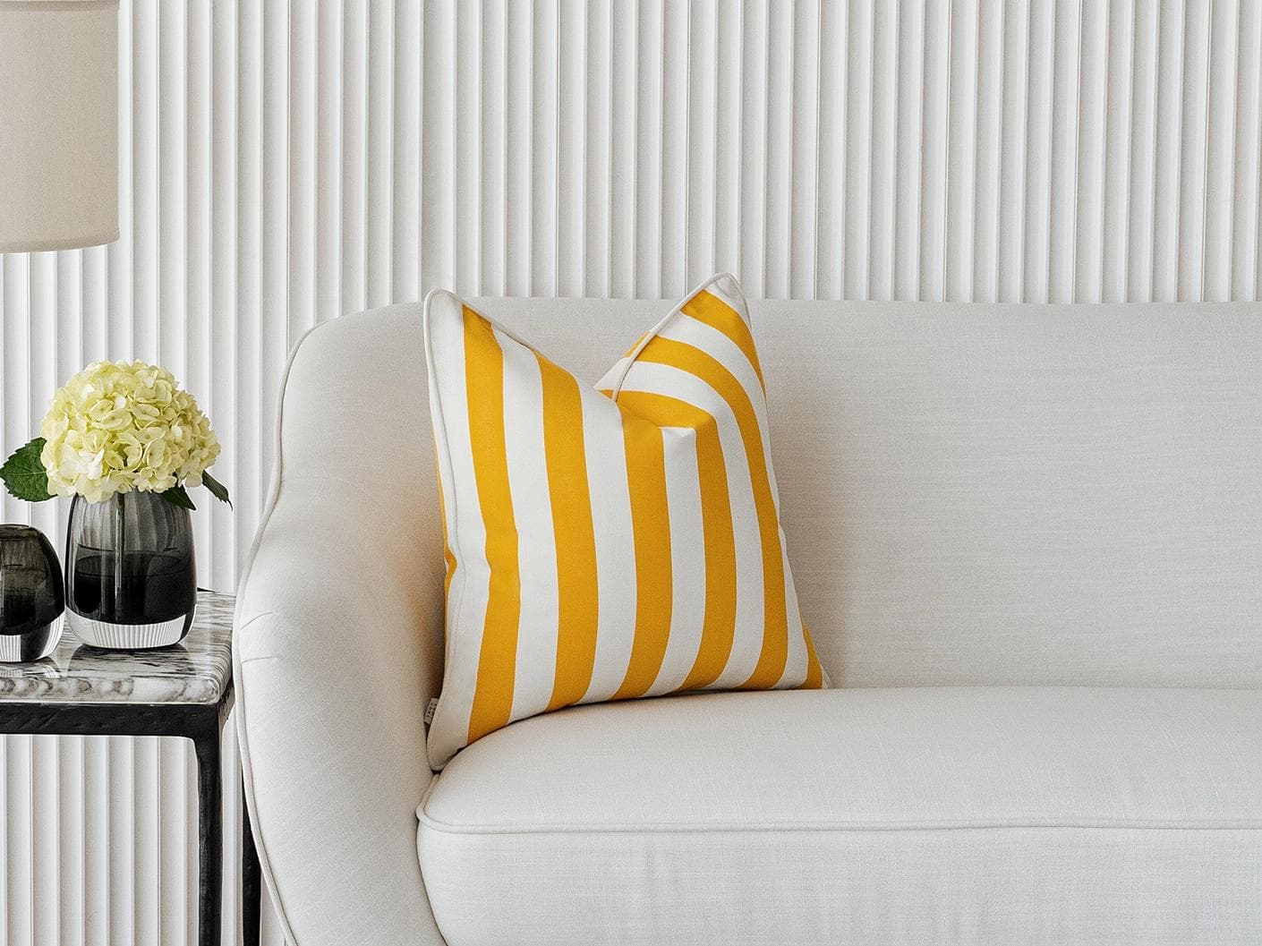Aelia Gaze cushion in yellow, shown in a lifestyle left view as image 4