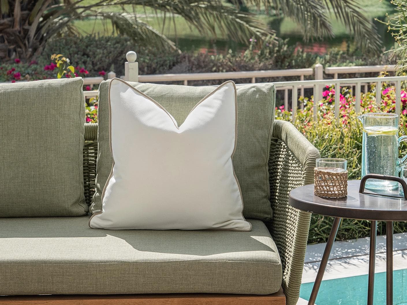Aelia Linen cushion in ivory, shown in a lifestyle front view as image 4
