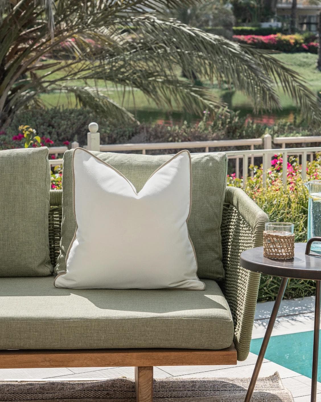 Aelia Linen cushion in ivory, shown in a lifestyle front view as image 4