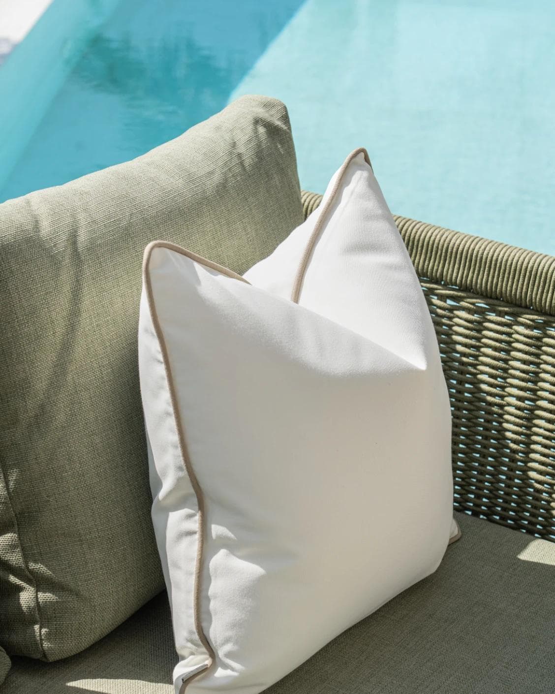 Aelia Linen cushion in ivory, shown in a lifestyle left view as image 5