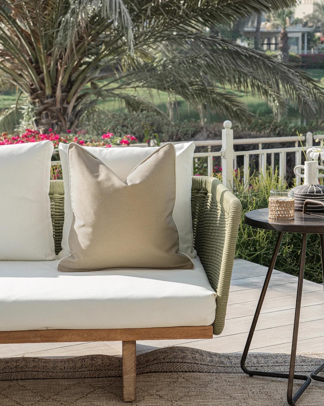 Aelia Mocha cushion in beige, shown in a lifestyle front view as image 4