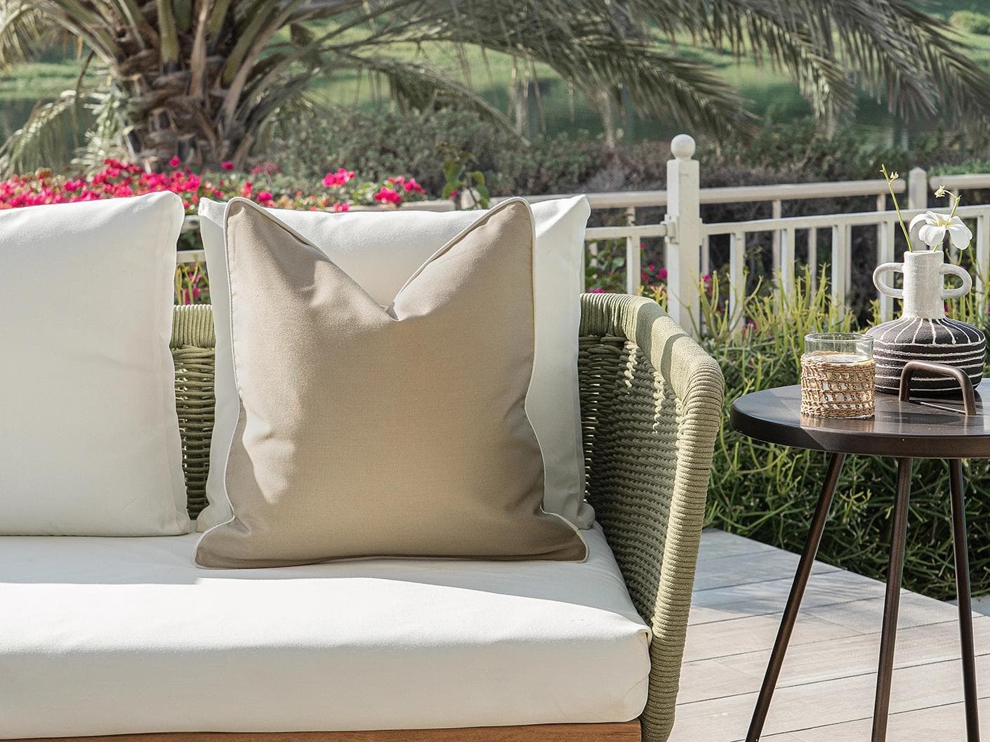 Aelia Mocha cushion in beige, shown in a lifestyle front view as image 4