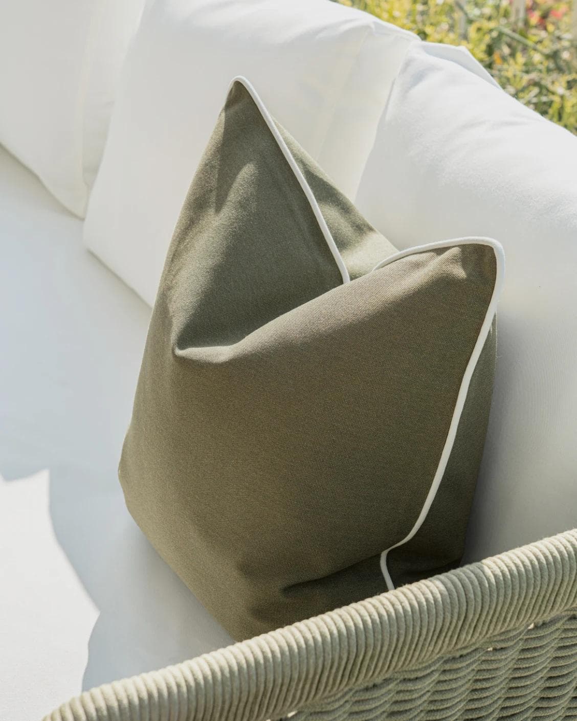 Aelia Olive cushion in deep olive and green, shown in a lifestyle right view as image 5