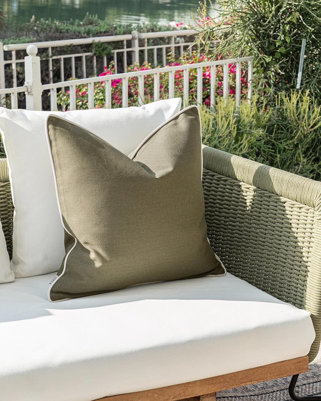 Aelia Olive cushion in deep olive and green, shown in a product left view as image 2