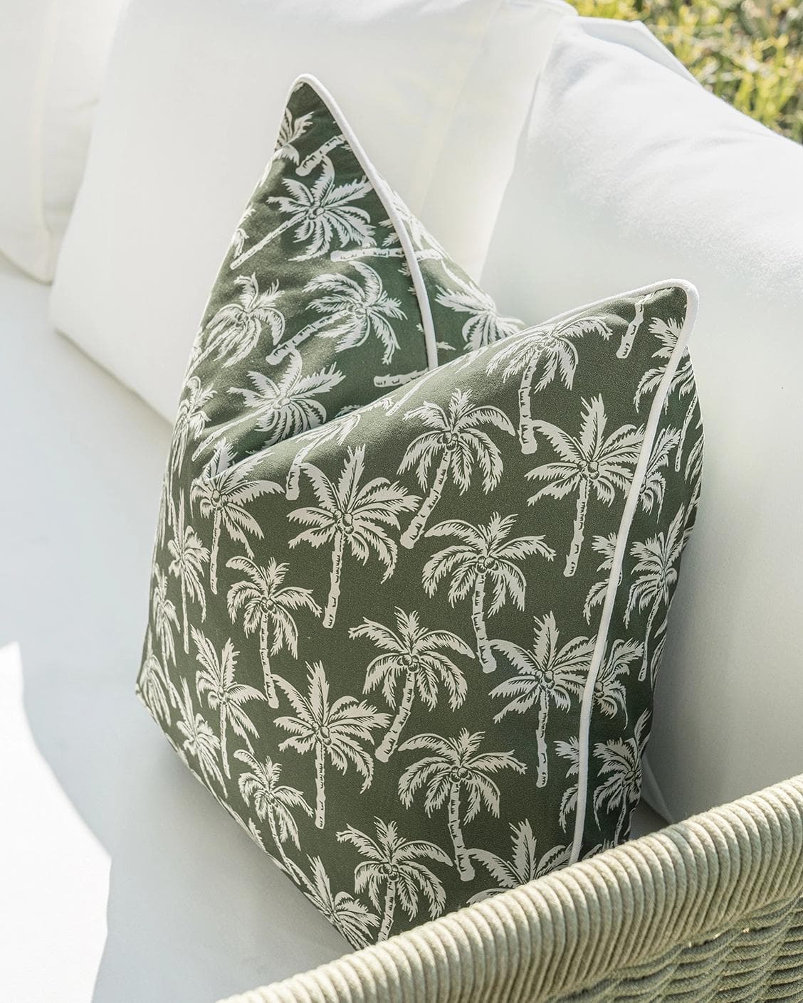 Aelia Palm cushion in green, shown in a lifestyle right view as image 4