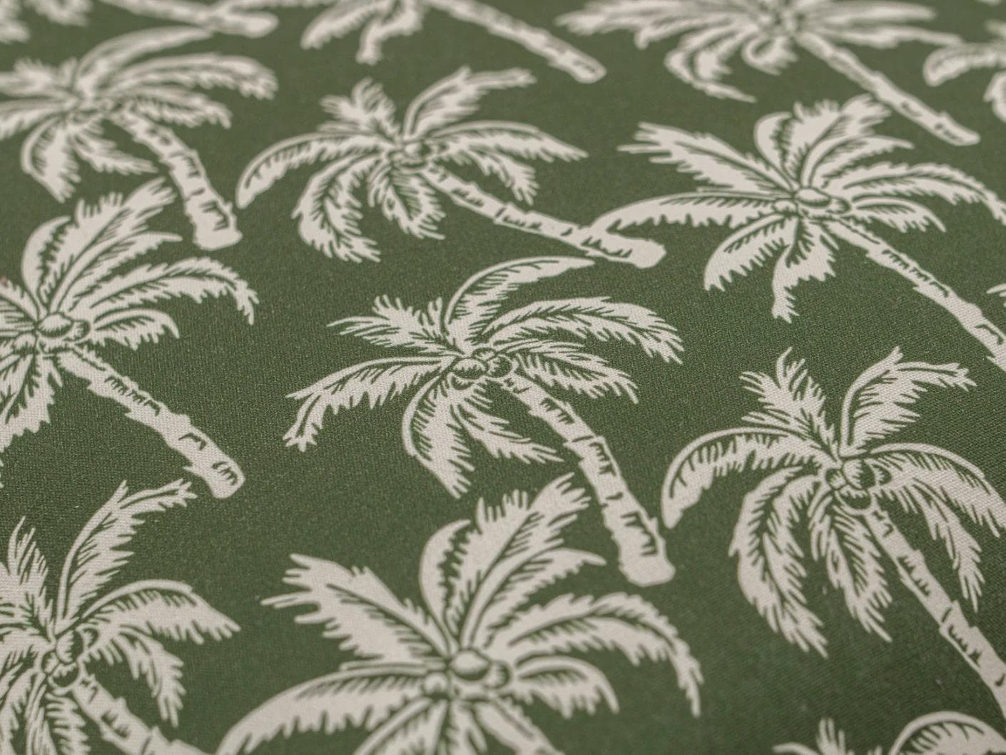 Aelia Palm cushion in green, shown in a product close-up as image 5