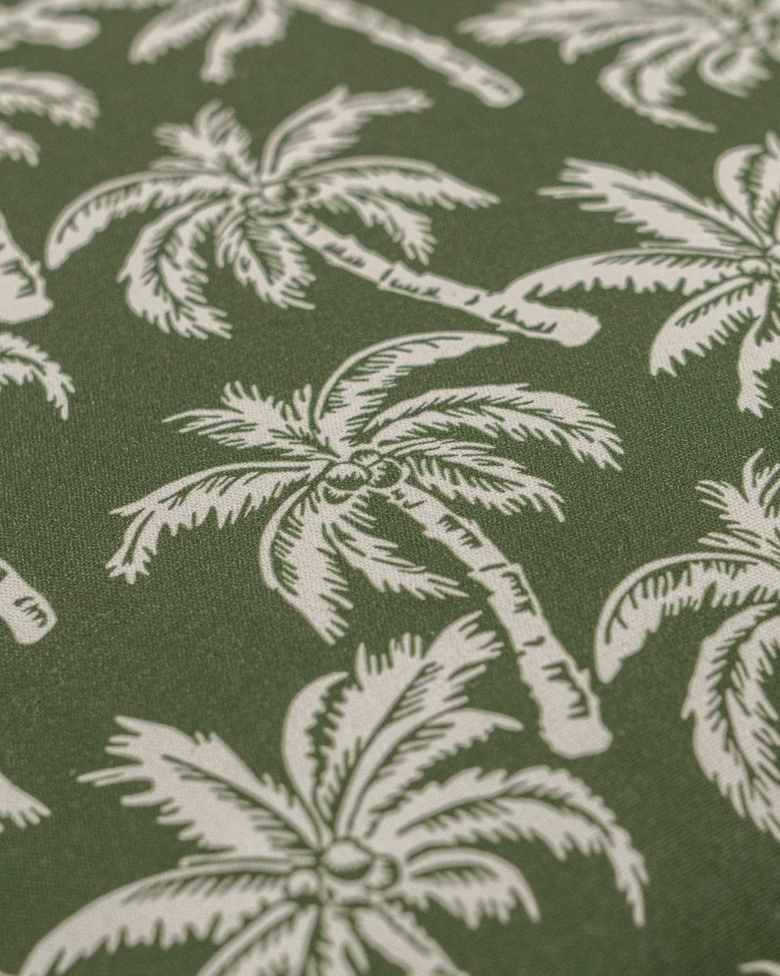 Aelia Palm cushion in green, shown in a product close-up as image 5