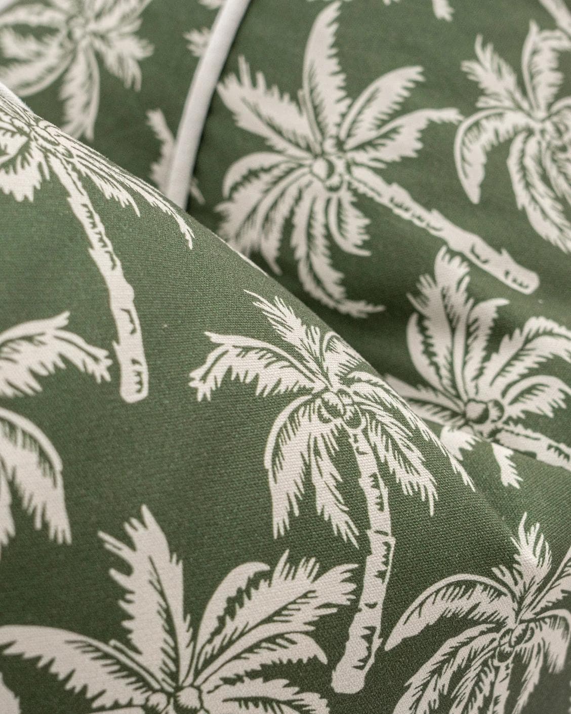 Aelia Palm cushion in green, shown in a product close-up as image 6