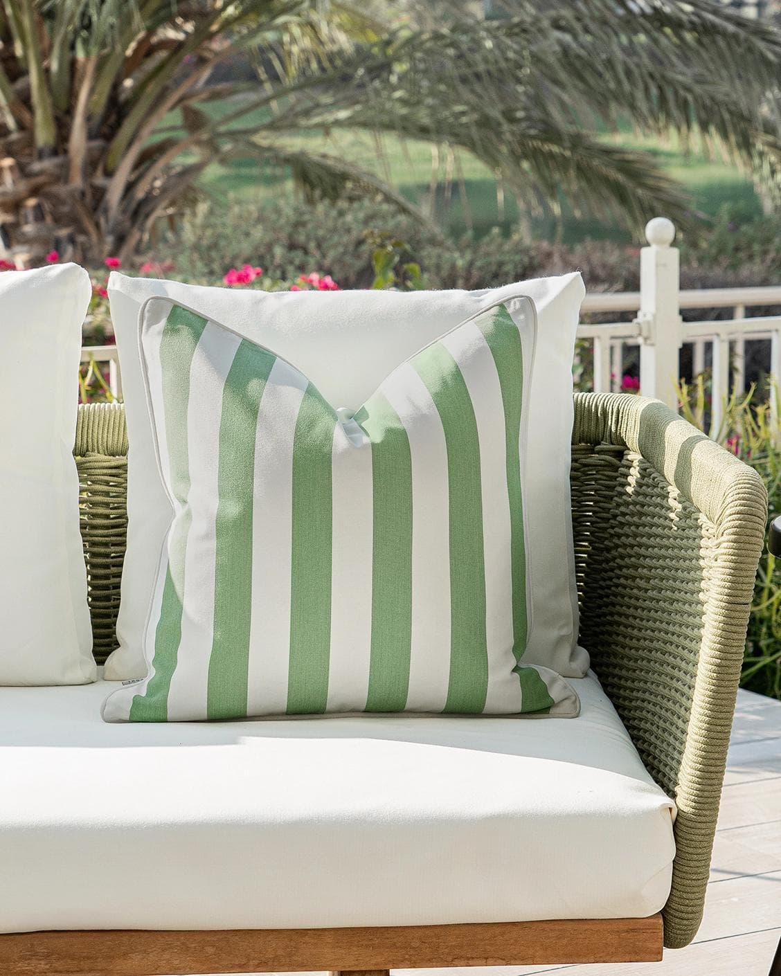 Aelia Pistachio cushion in forest green and green, shown in a lifestyle front view as image 4
