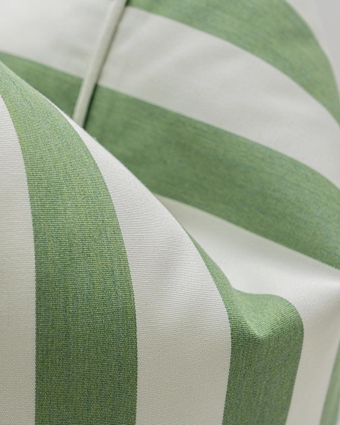 Aelia Pistachio cushion in forest green and green, shown in a product close-up as image 6