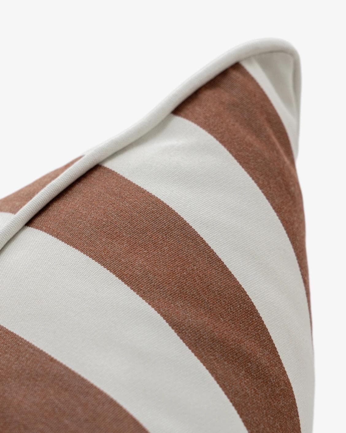 Aelia Rust cushion in ivory, shown in a product close-up as image 7