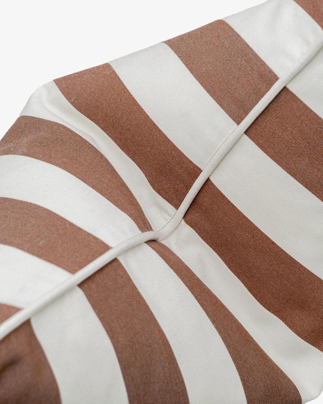 Aelia Rust cushion in ivory, shown in a product top view as image 9