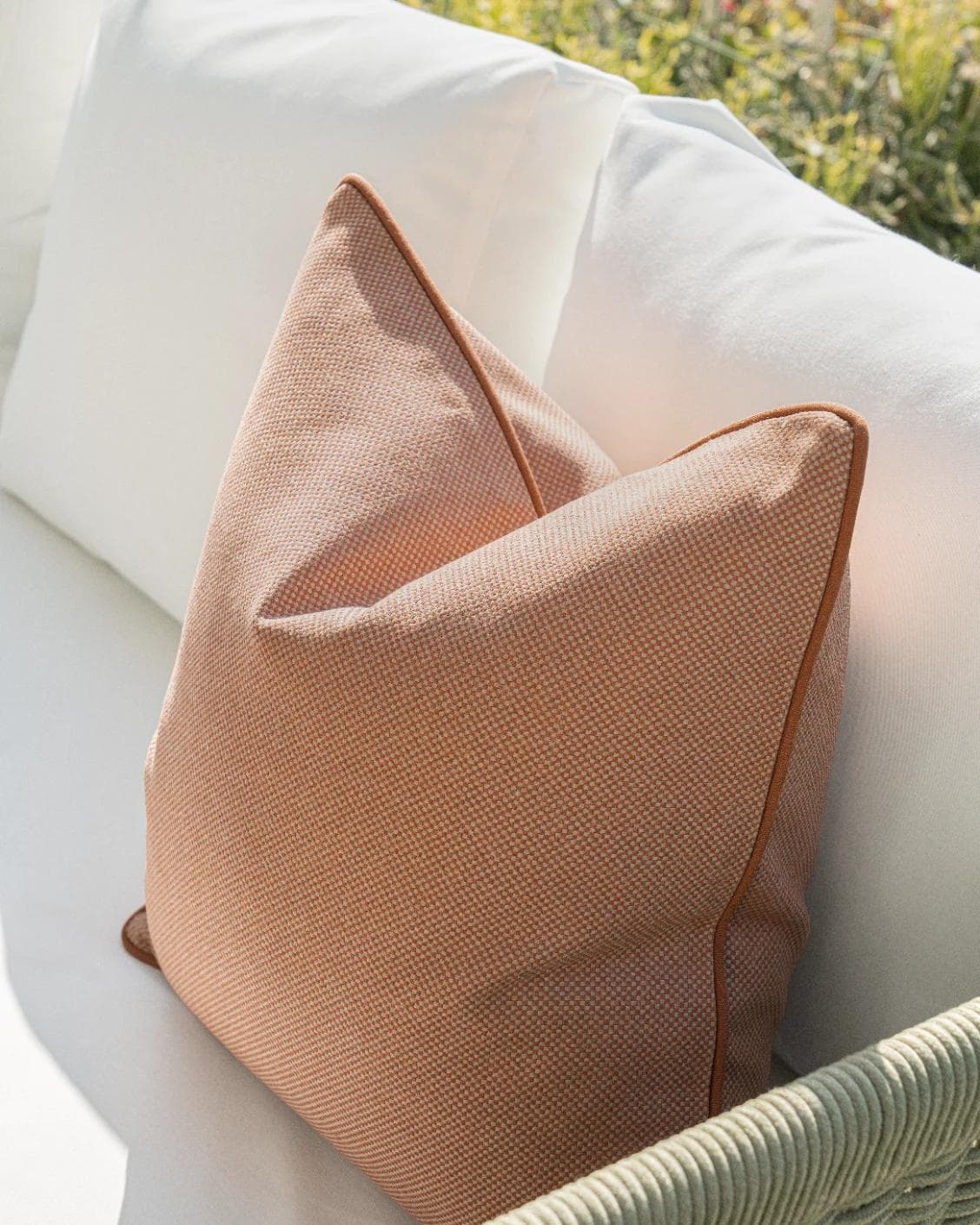 Aelia Tangelo cushion in rust, shown in a lifestyle right view as image 5