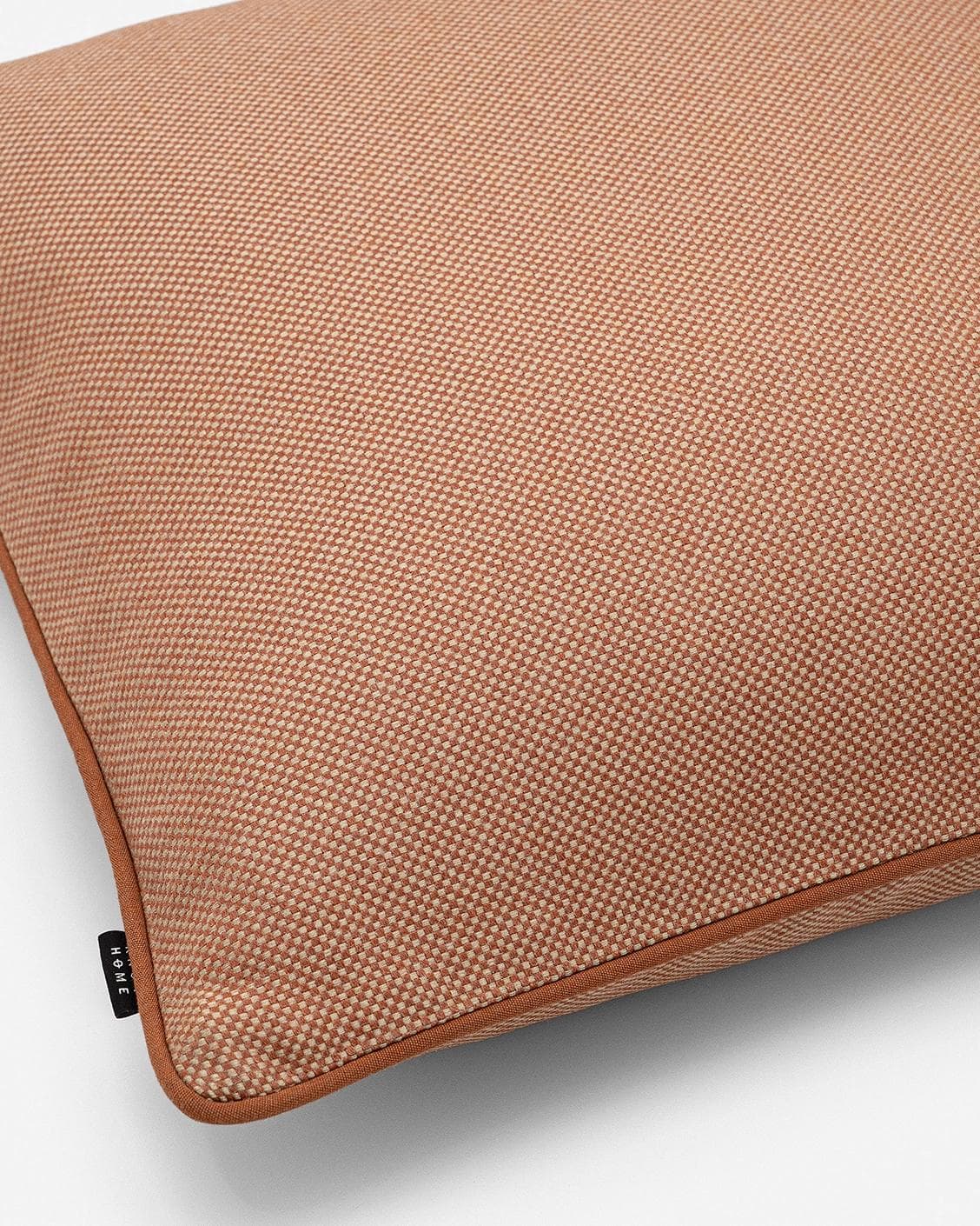 Aelia Tangelo cushion in rust, shown in a product left view as image 9
