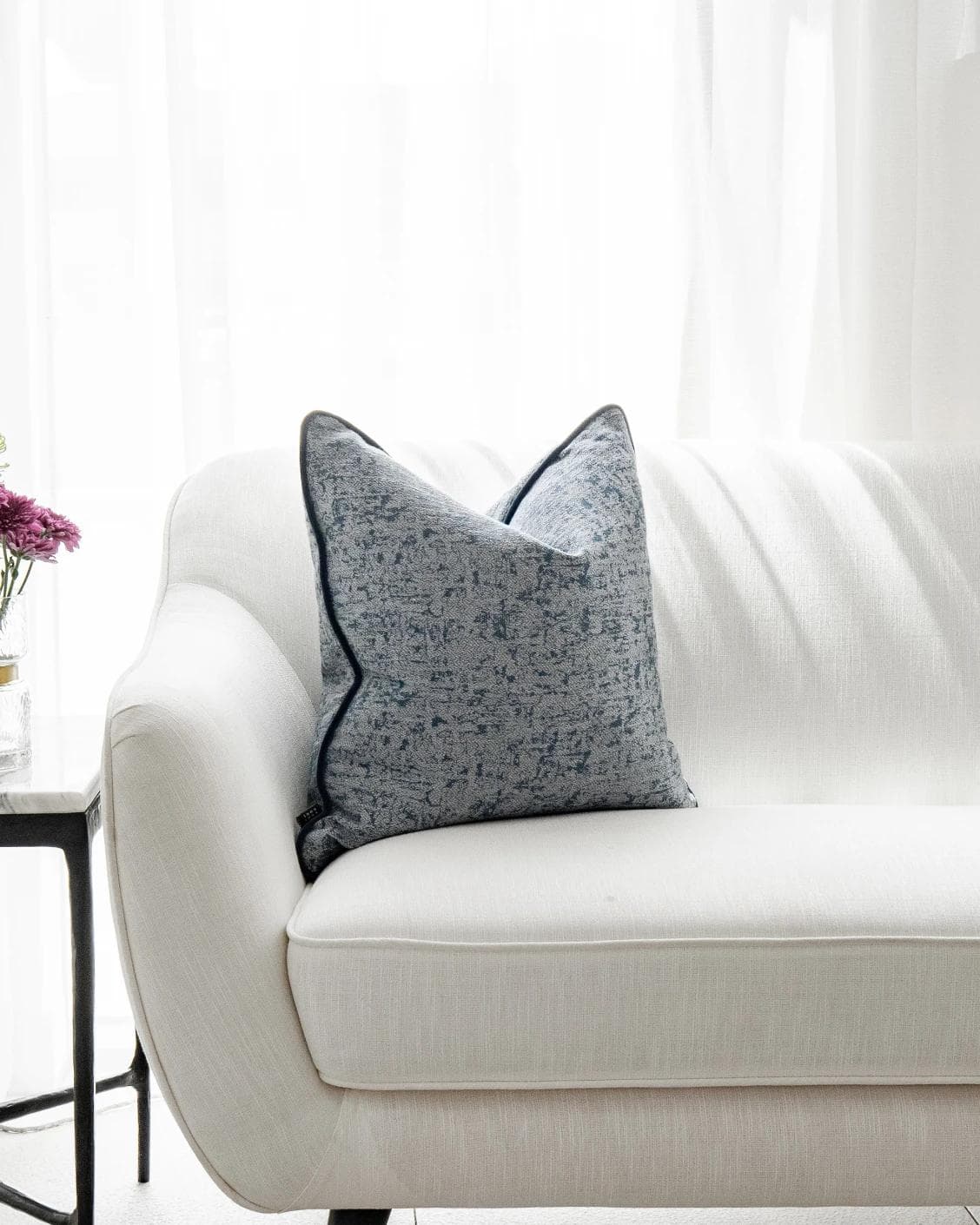 Alba Canova cushion in navy, grey and blue, shown in a lifestyle right view as image 4