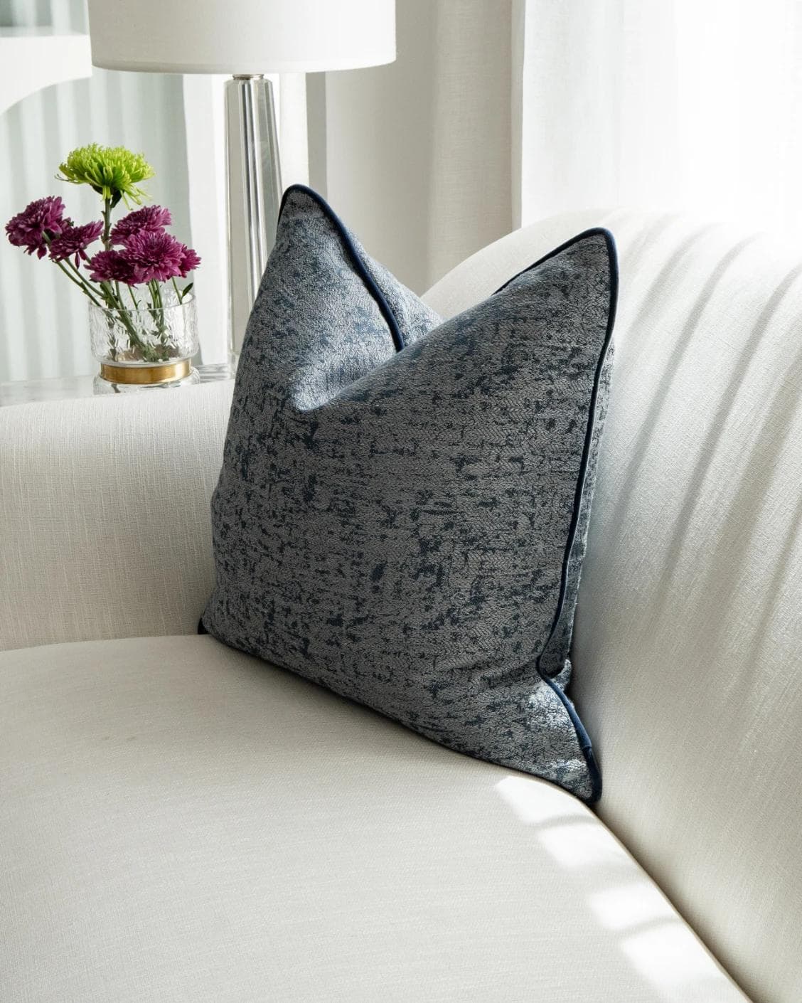 Alba Canova cushion in navy, grey and blue, shown in a lifestyle right view as image 5