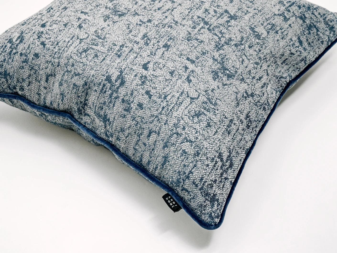 Alba Canova cushion in navy, grey and blue, shown in a product top view as image 6