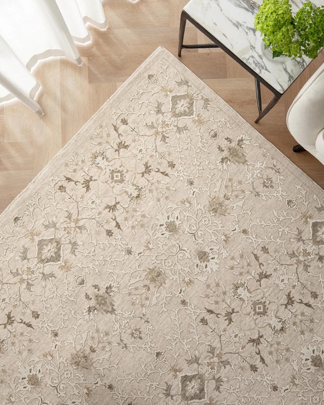 Albert Terra carpet in beige and brown, shown in a lifestyle top view as image 2