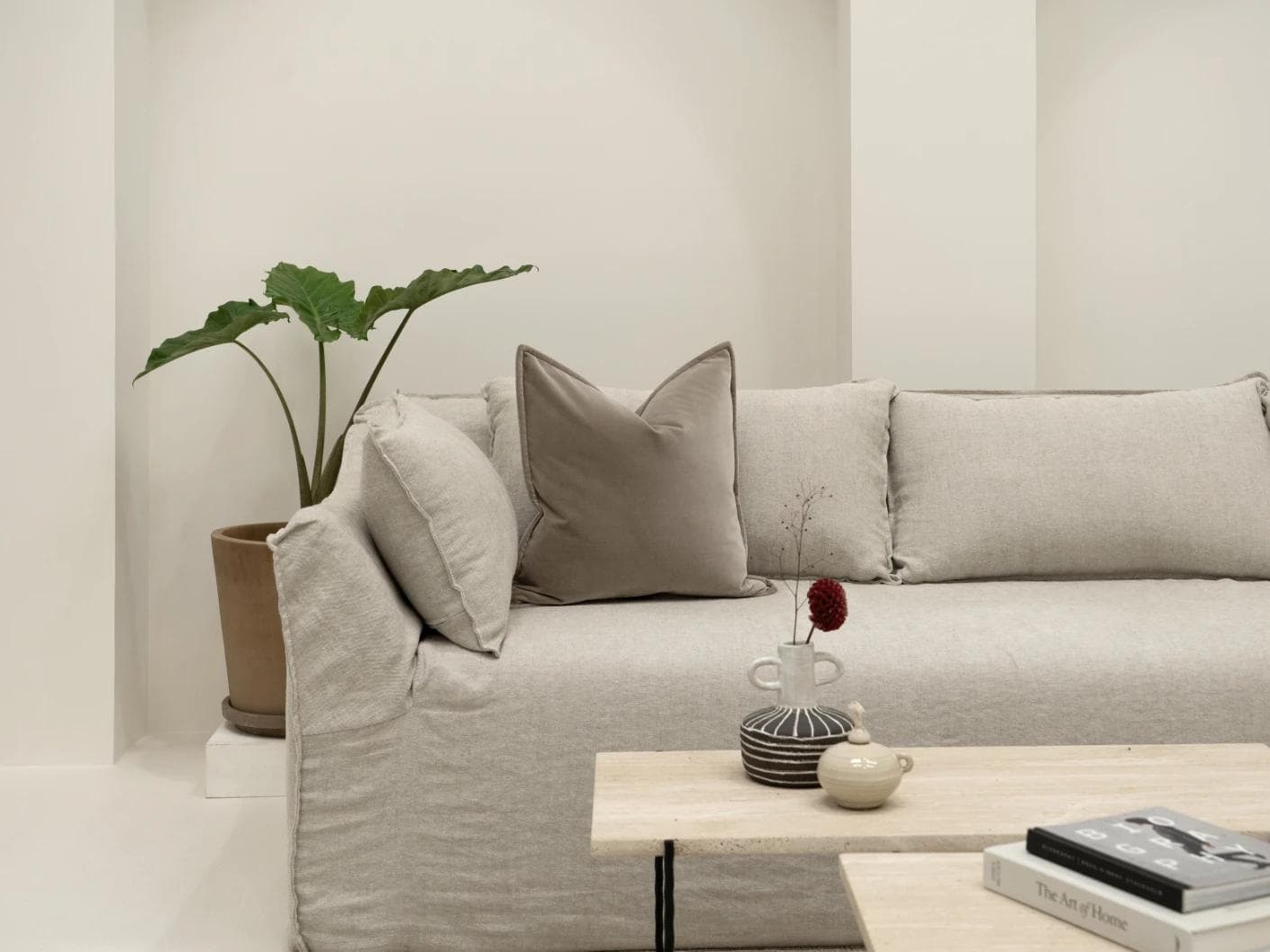 Alessandra Alpaca cushion in brown, shown in a lifestyle front view as image 4