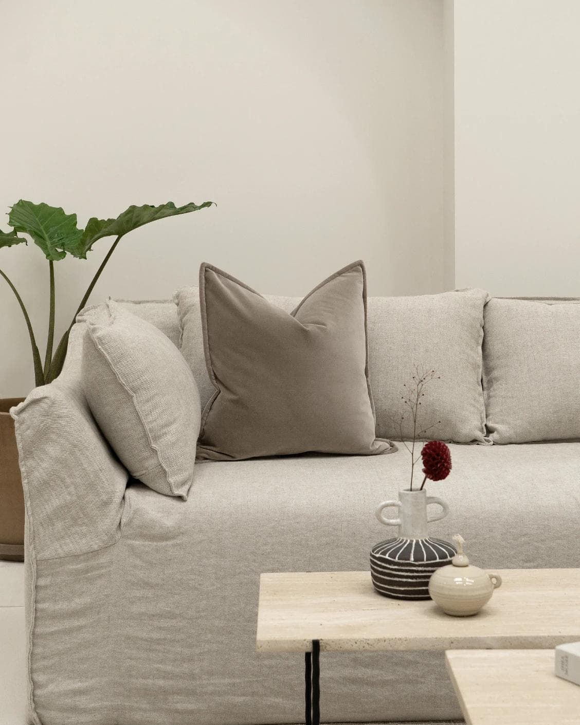 Alessandra Alpaca cushion in brown, shown in a lifestyle front view as image 4