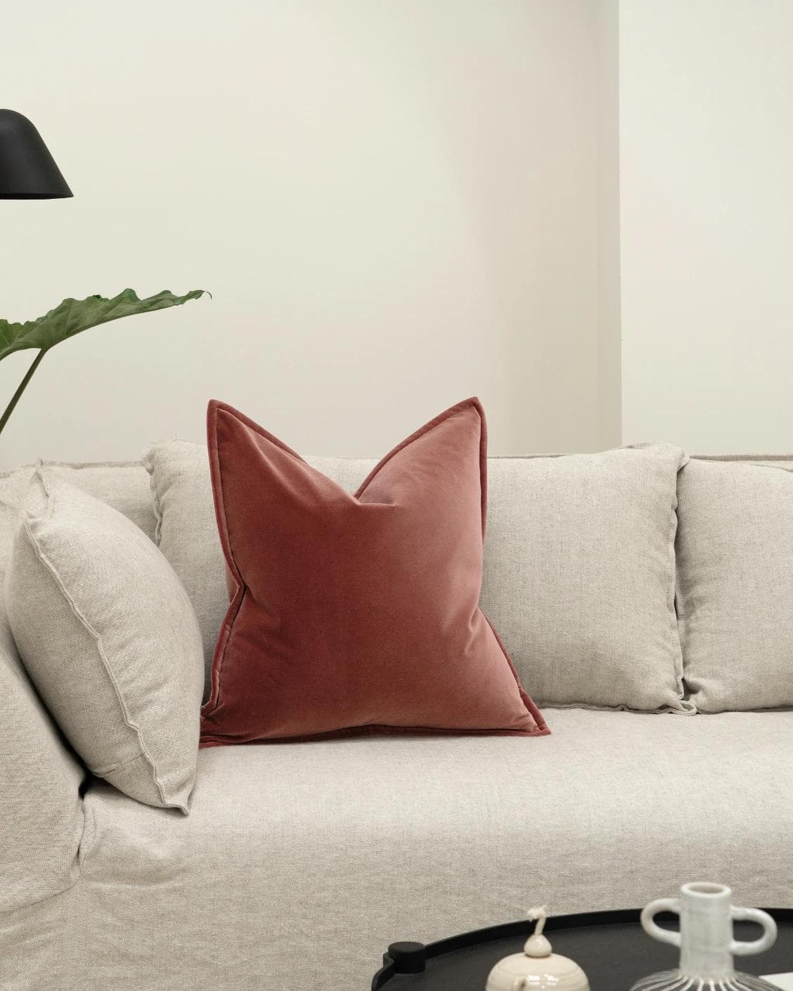 Alessandra Berry cushion in red and pink, shown in a lifestyle front view as image 4