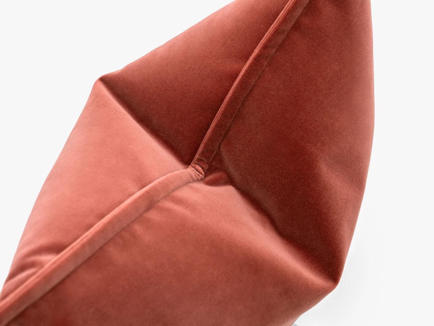 Alessandra Blush cushion in pink and red, shown in a lifestyle top view as image 6
